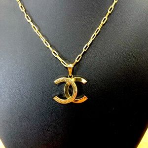 Brand New 18K SOLID GOLD (not filled or plated) CC pendant. CHAIN NOT INCLUDED!